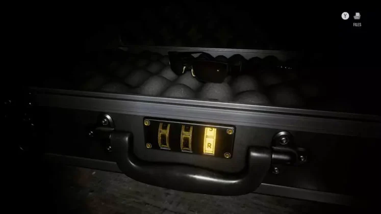 Ảnh S.T.A.R.S. Office Briefcase trong phần bonus Barry&rsquo;s Scavenger Hunt RE9, li&ecirc;n quan m&atilde; R-R-R v&agrave; Power Shades Charm.